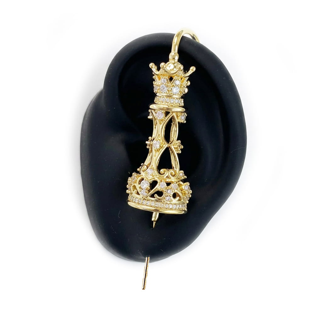 Royal Queen ear cuff in gold on a black ear form