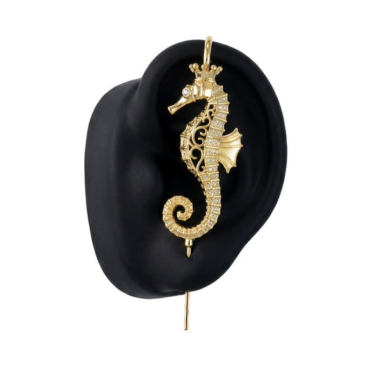 Imperial Seahorse ear cuff in gold on a black ear form
