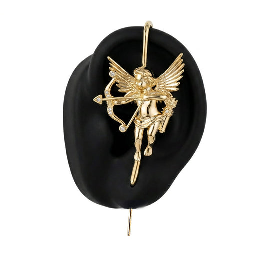 Cupid ear cuff in gold on a black ear form