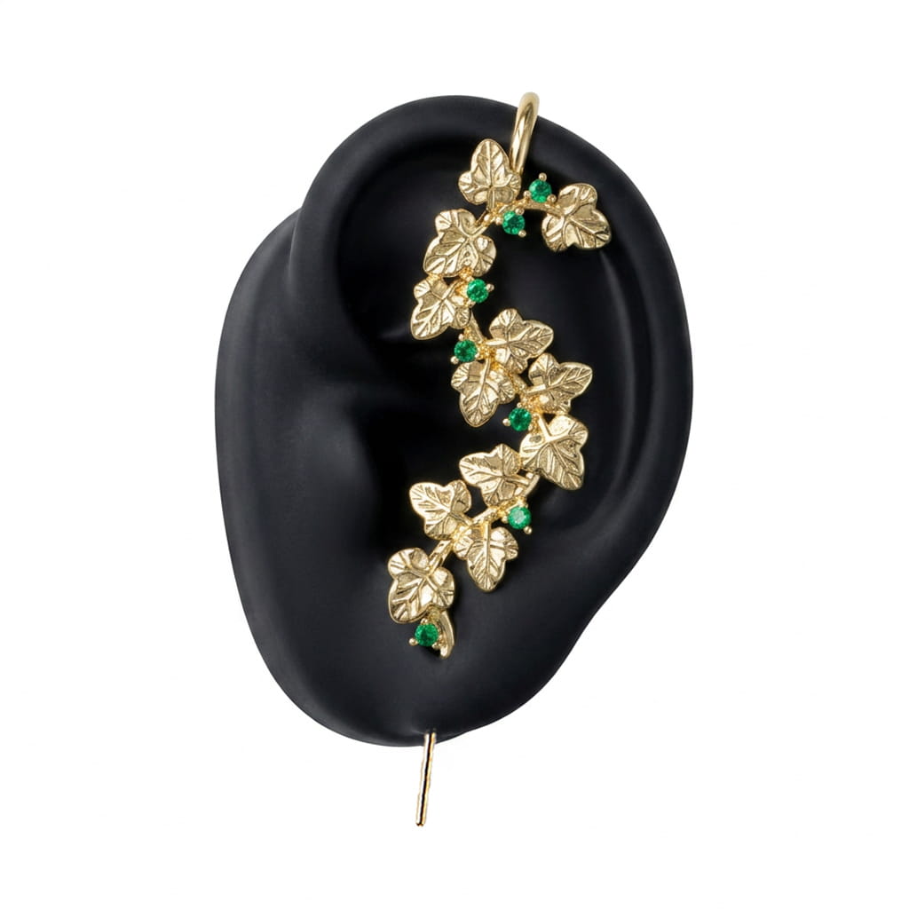 Creeping Ivy ear cuff in gold on a black ear form