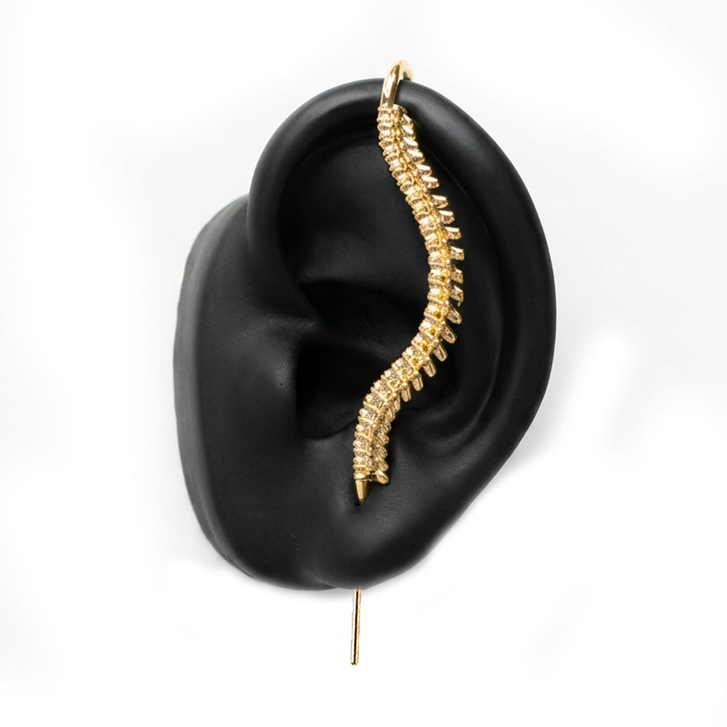 Spine-Chilling ear cuff in gold, left-ear version