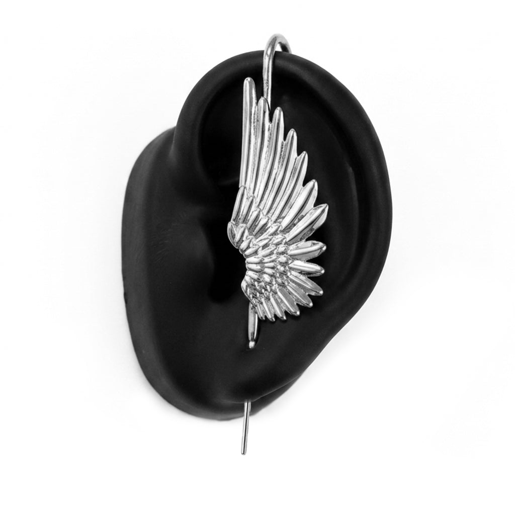 Celestial Wing ear cuff in silver on a black ear form