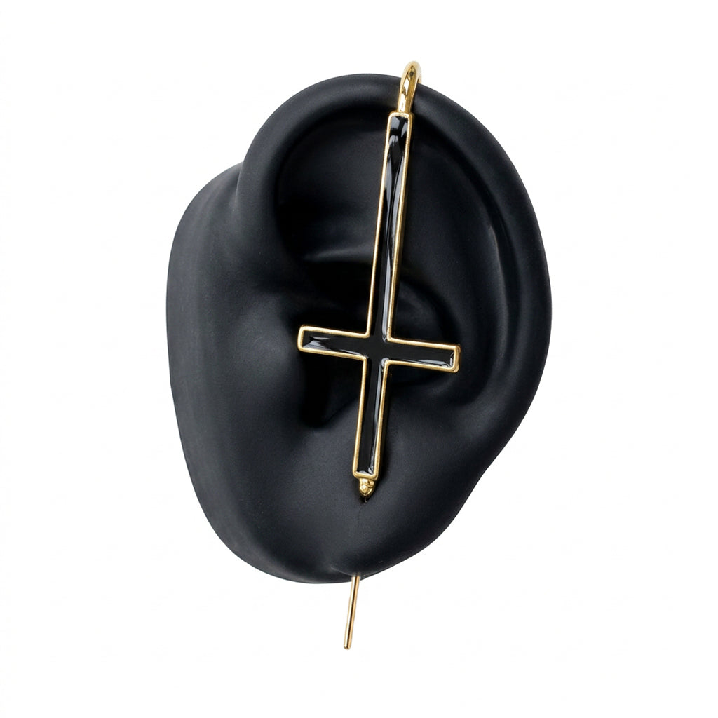 St. Peter Cross ear cuff in gold on a black ear form