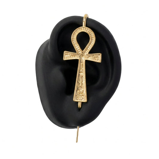 Ankh ear cuff in gold on a black ear form