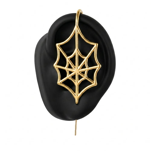 Silky Web ear cuff in gold on a black ear form