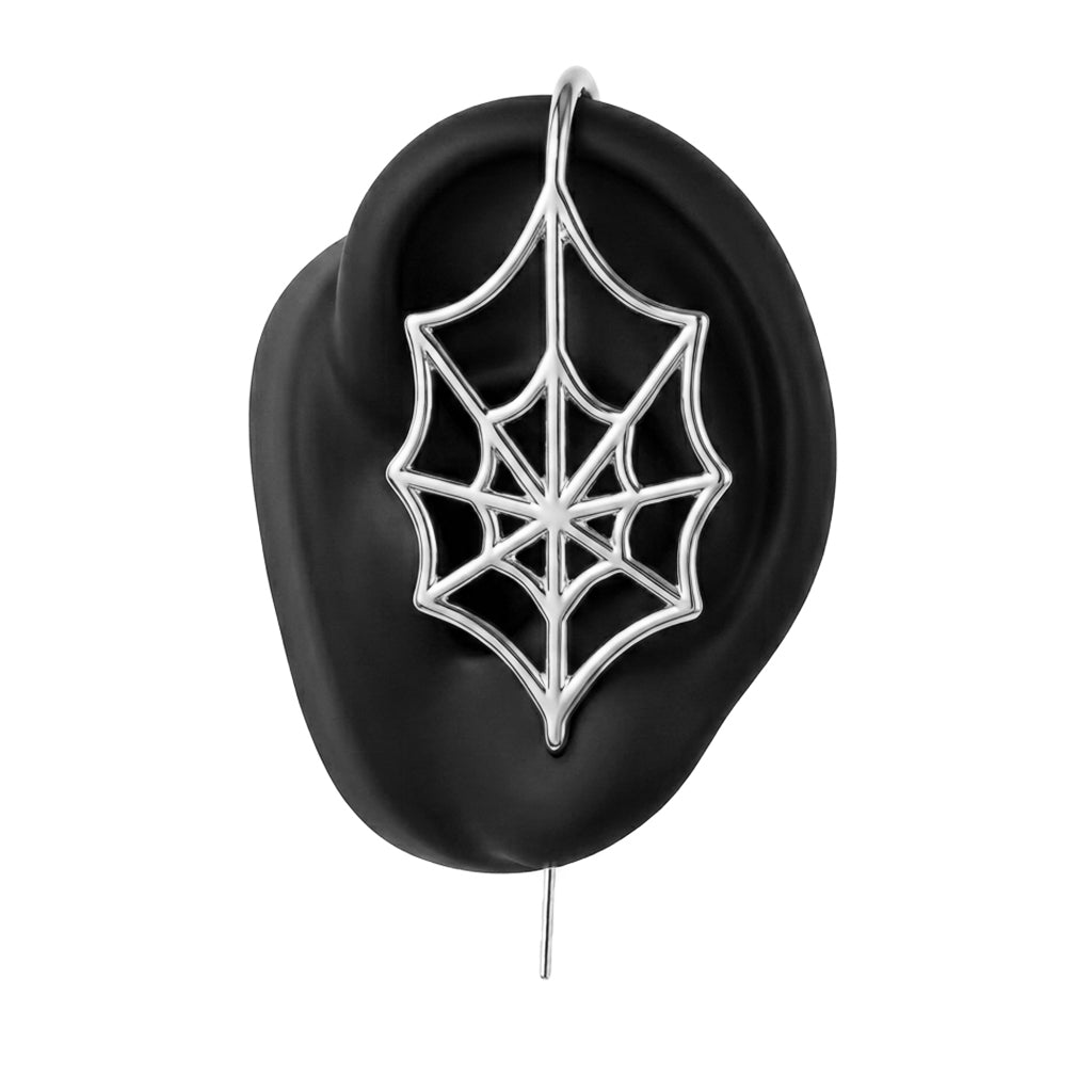 Silky Web ear cuff in silver on a black ear form