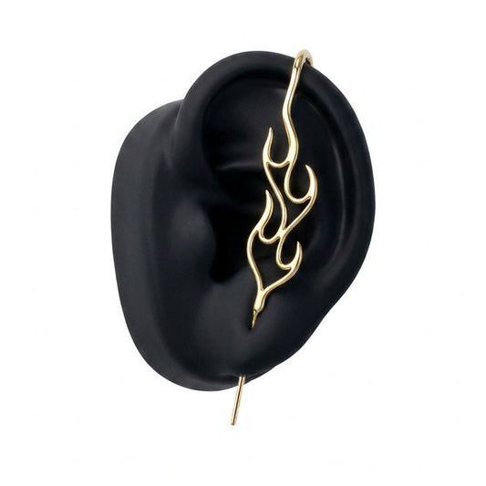 Inner Fire ear cuff in gold on a black ear form
