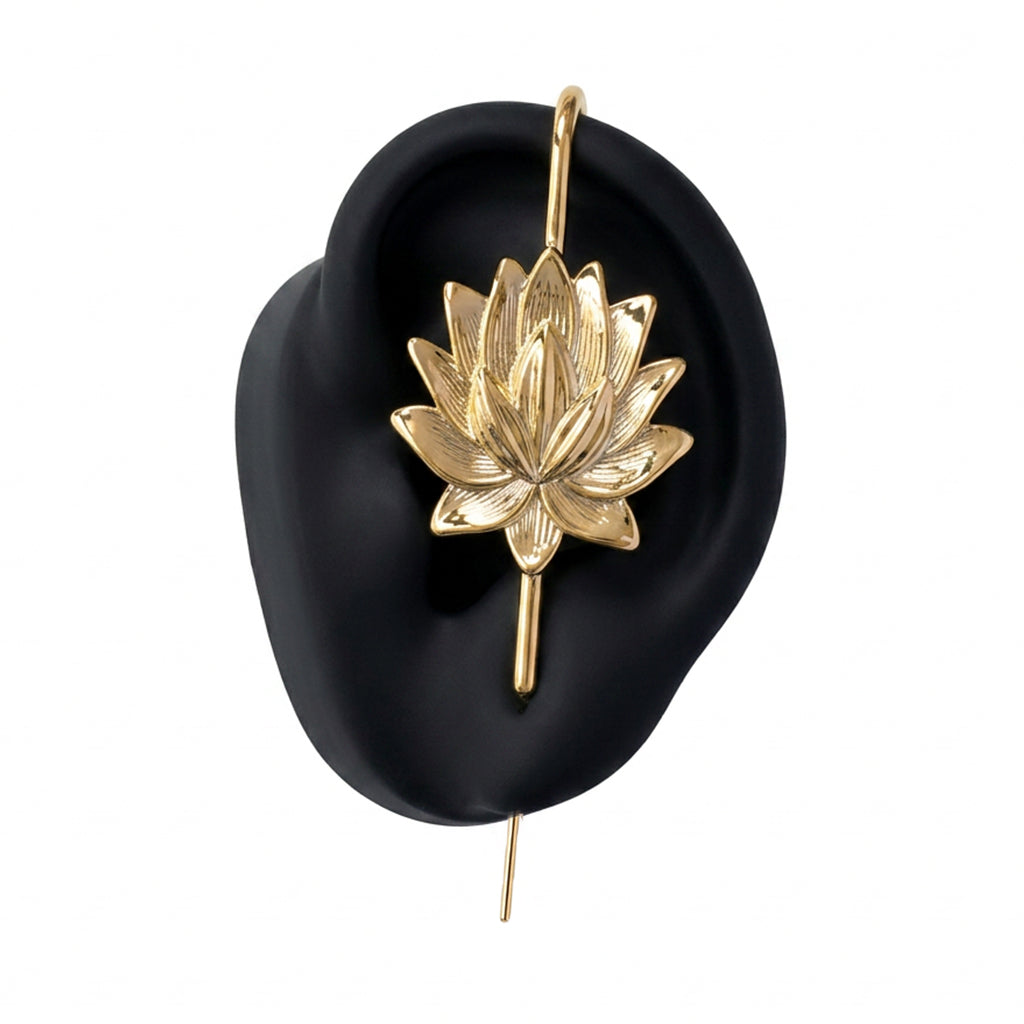 Lotus Bloom ear cuff in gold on a black ear form