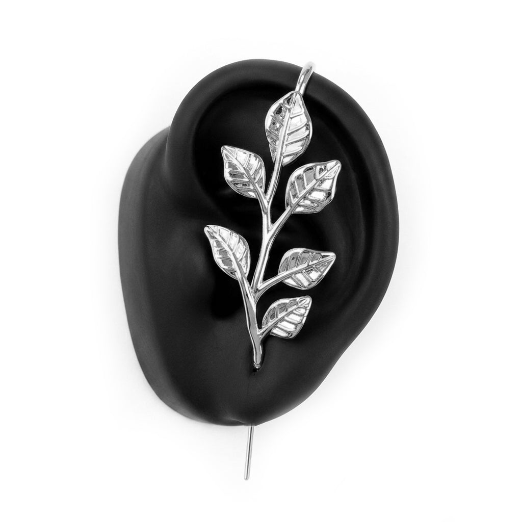 Whispering Leaves ear cuff in silver on a black ear form