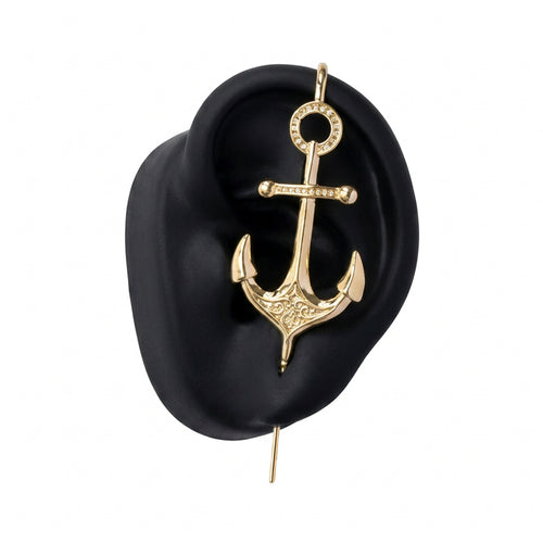 Safe Haven ear cuff in gold on a black ear form