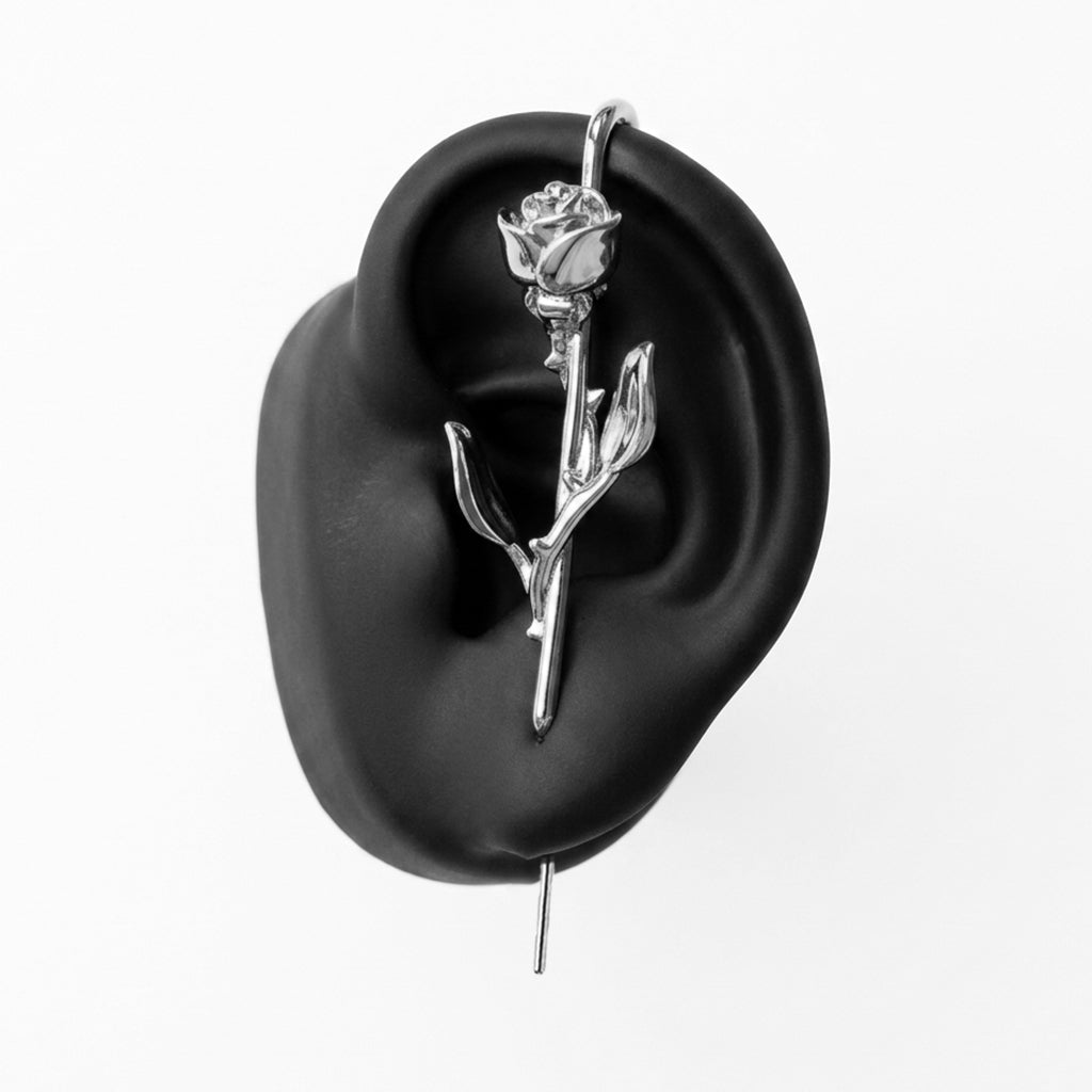 Radiant Rose ear cuff in silver on a black ear form