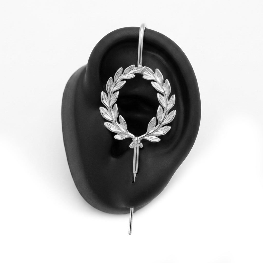Regel Laurel ear cuff in silver on a black ear form