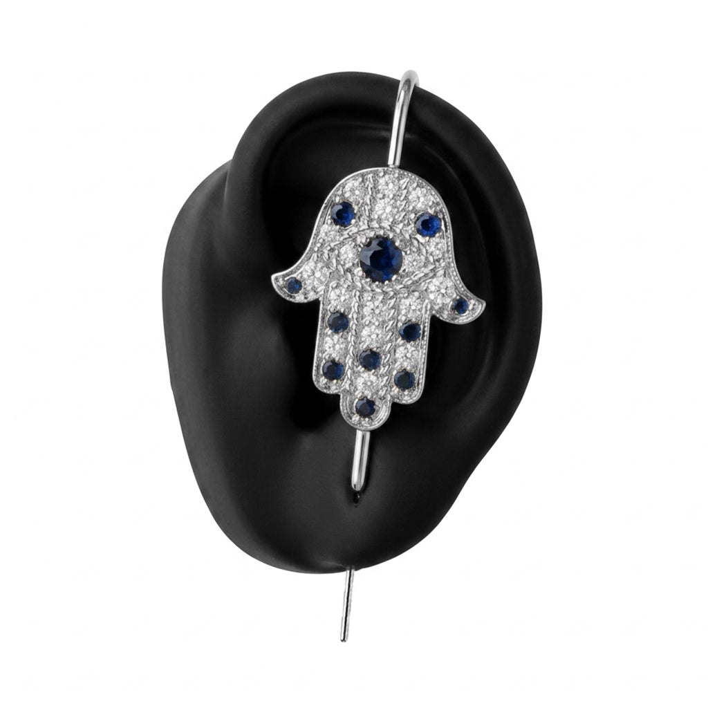Hamsa ear cuff in silver on a black ear form