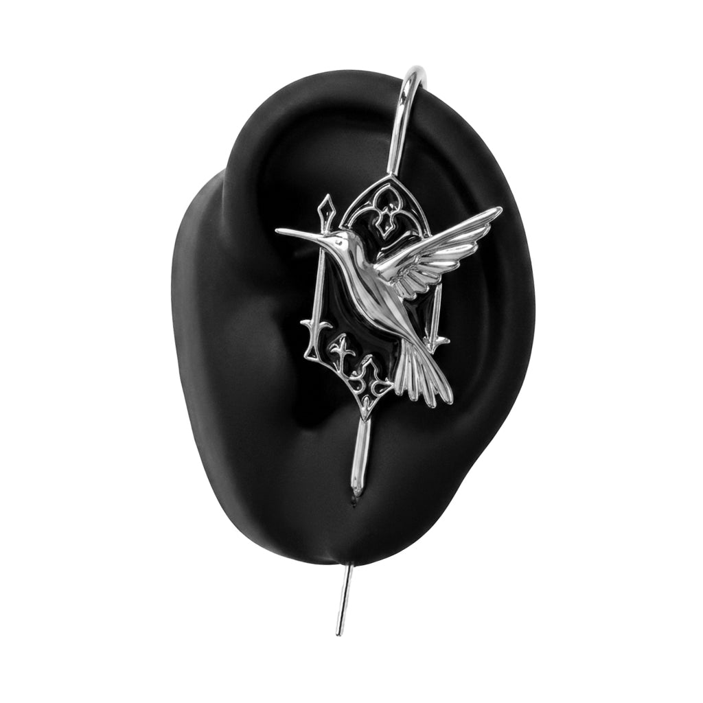Hummingbird ear cuff in silver on a black ear form