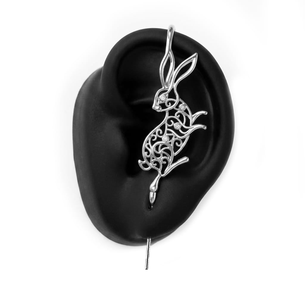 Leaping Hare ear cuff in silver on a black ear form
