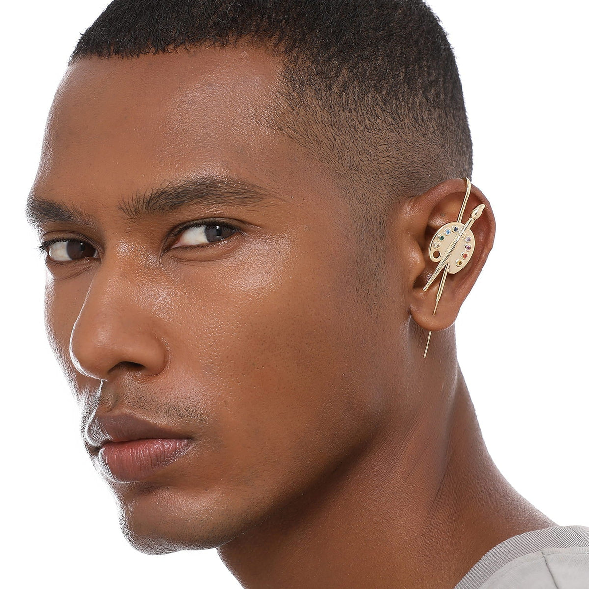 Artist ear cuff worn on the ear, profile view