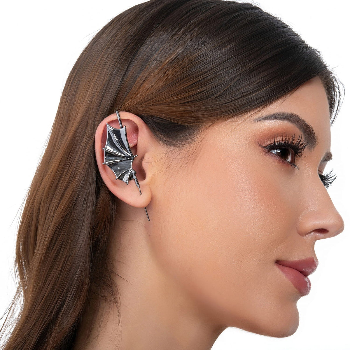 Nightfall Wings ear cuff in black on a black ear form