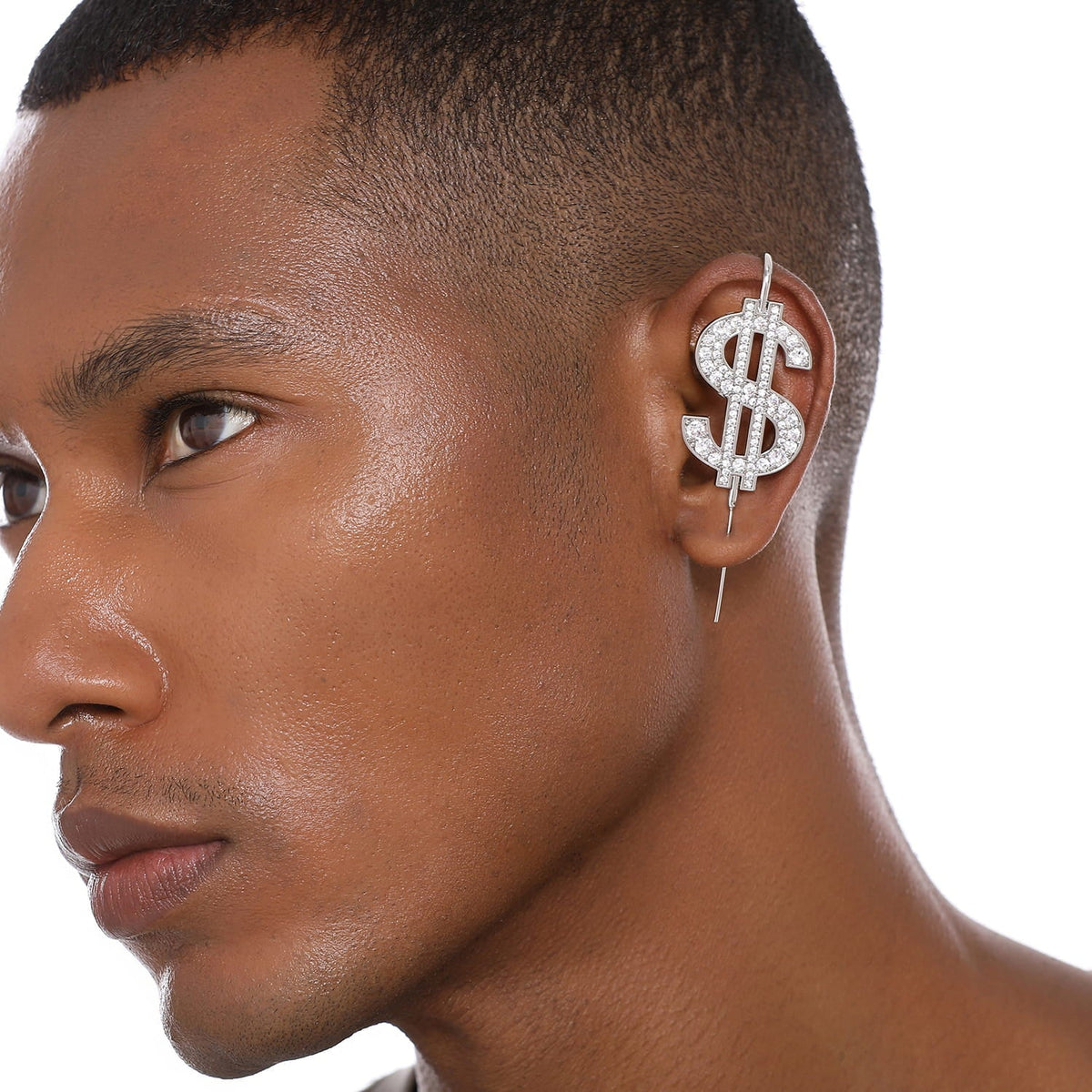 CA$H ear cuff worn on the ear, profile view
