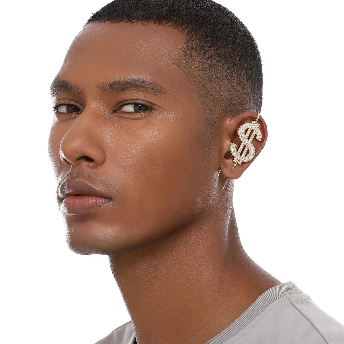 CA$H ear cuff worn on the ear, profile view