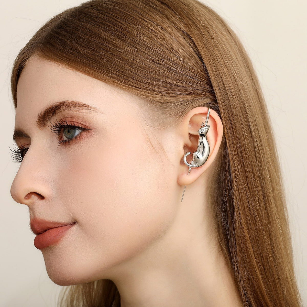 Mystic Cat ear cuff worn on the ear, profile view