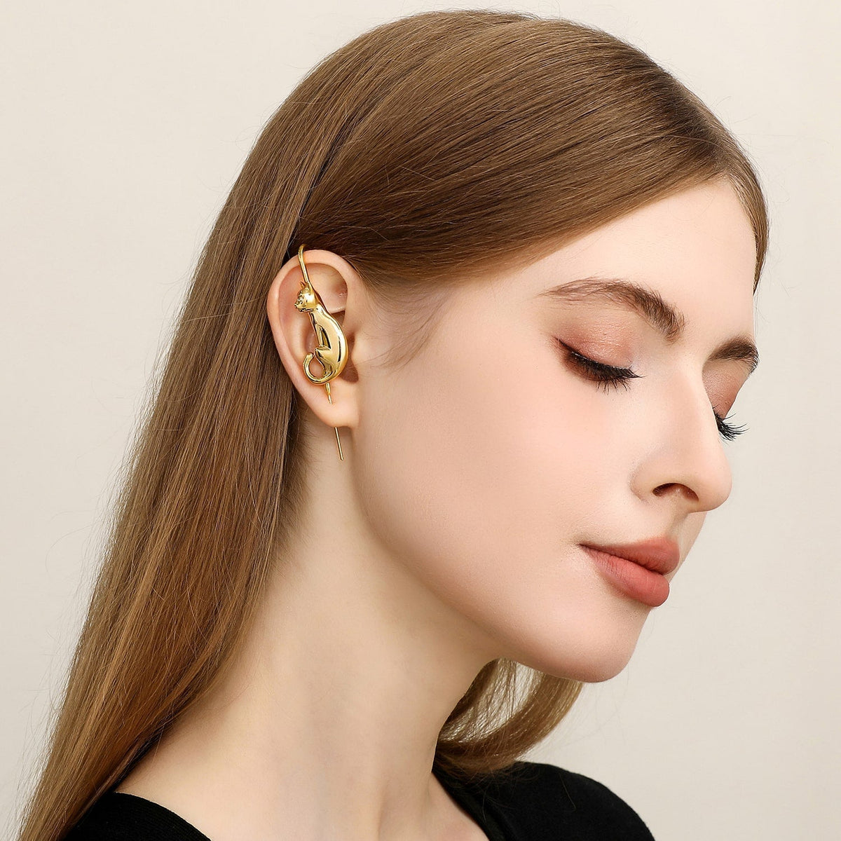 Mystic Cat ear cuff worn on the ear, profile view