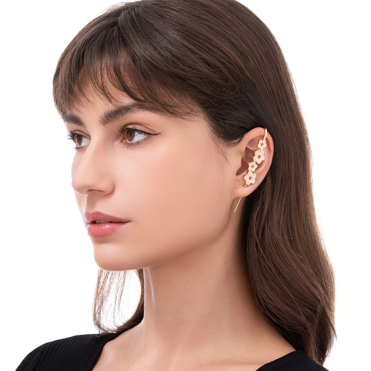 Cherry Blossom ear cuff worn on the ear, profile view