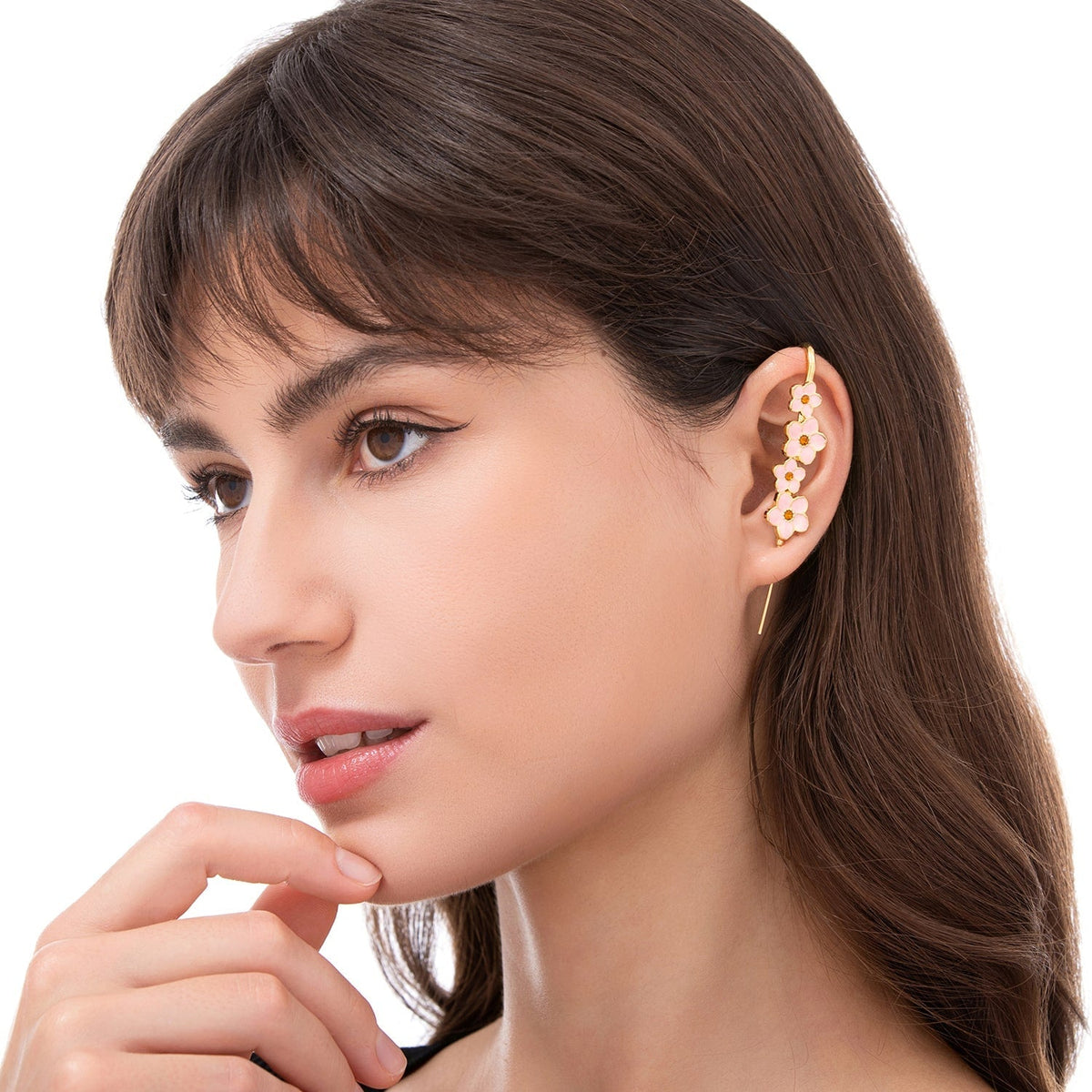 Cherry Blossom ear cuff worn on the ear, profile view
