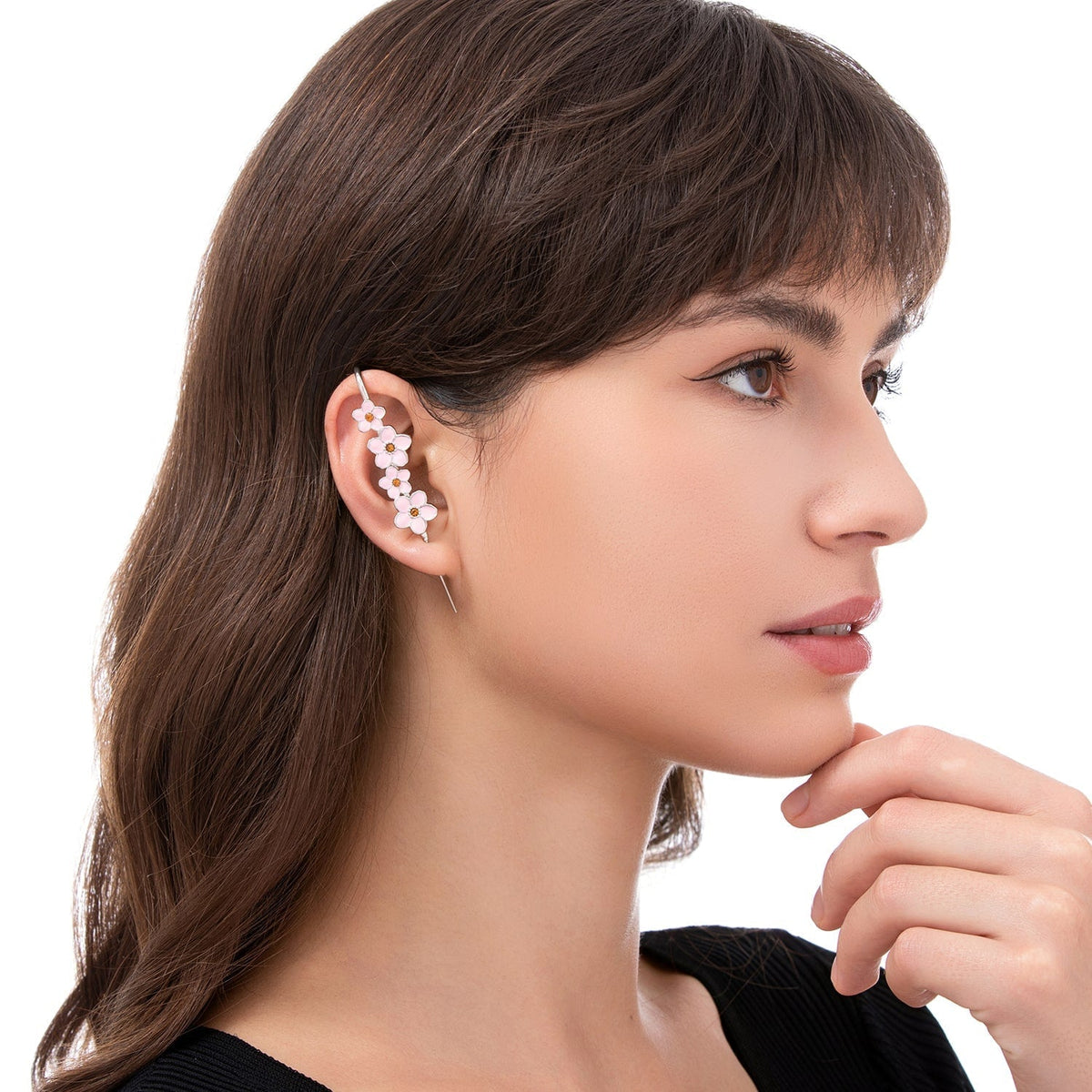 Cherry Blossom ear cuff worn on the ear, profile view