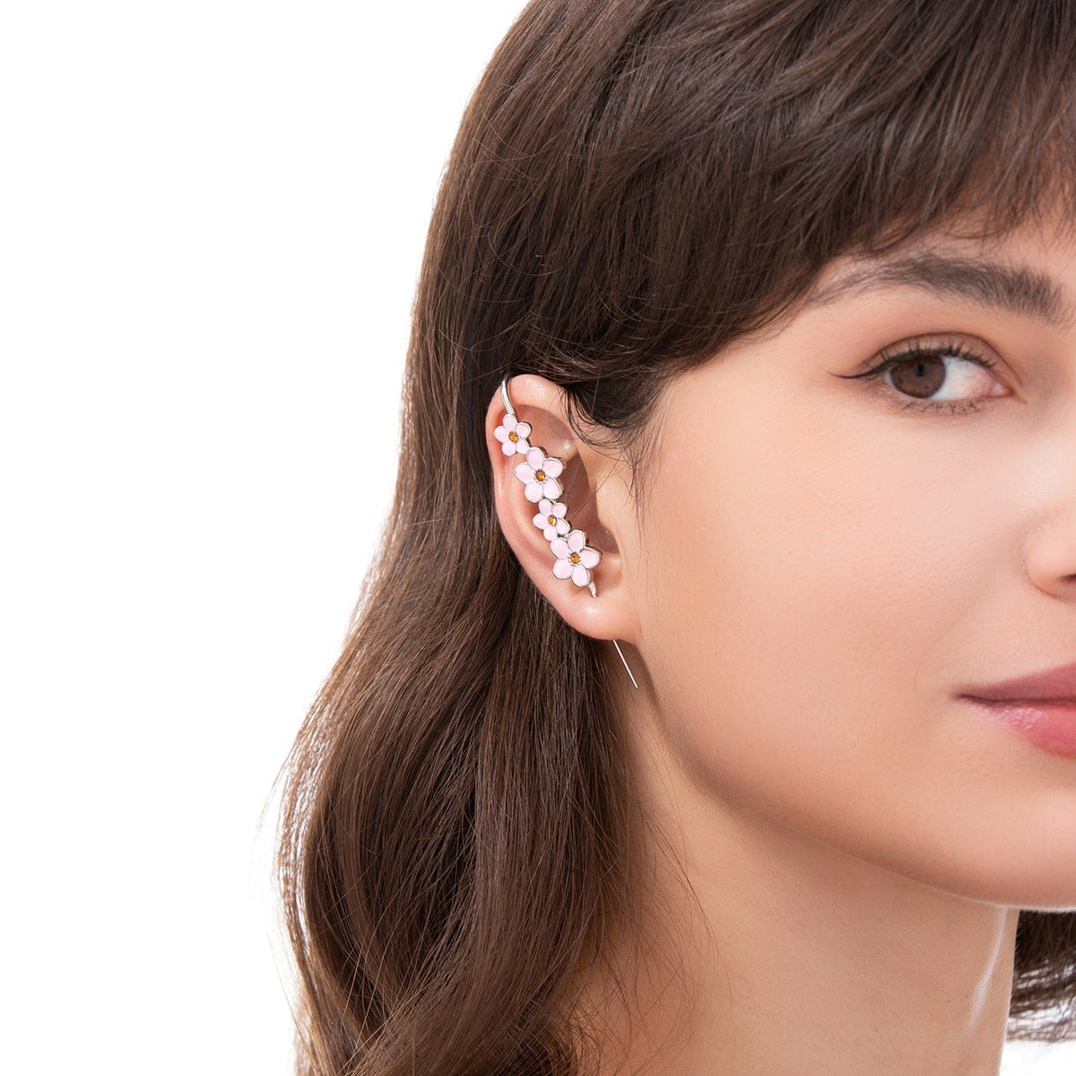 Cherry Blossom ear cuff worn on the ear, profile view