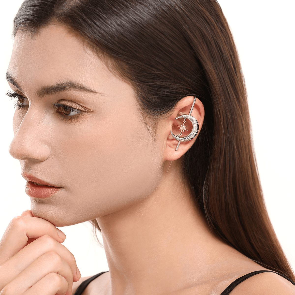 Cosmic Connection ear cuff in silver worn on the ear, profile view