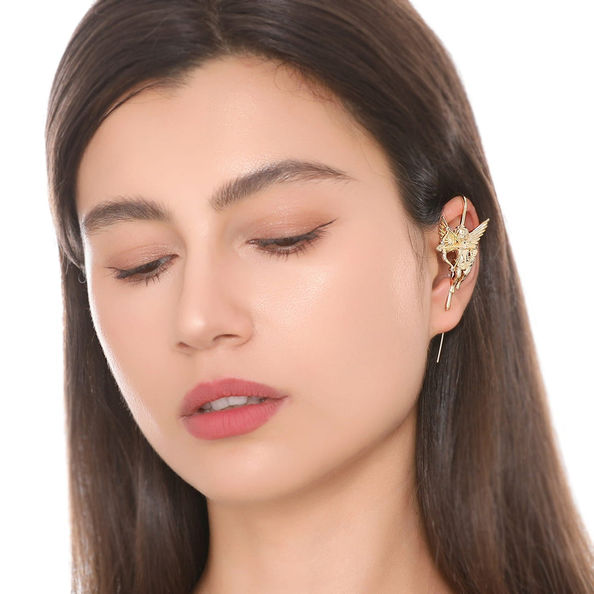 Cupid ear cuff worn on the ear, profile view