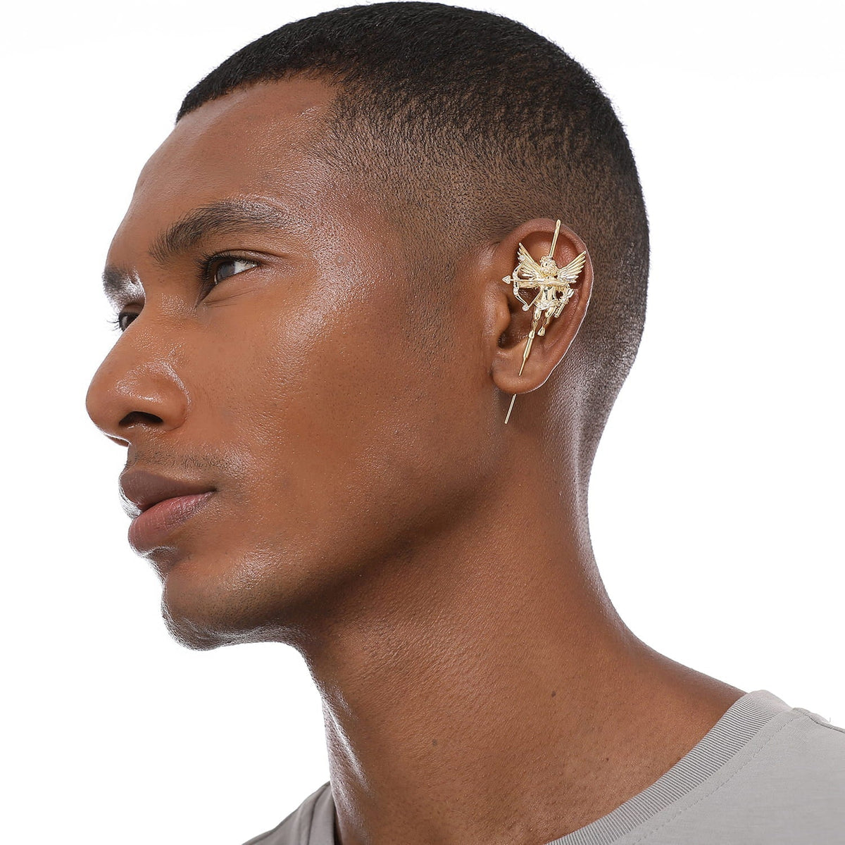 Cupid ear cuff worn on the ear, profile view