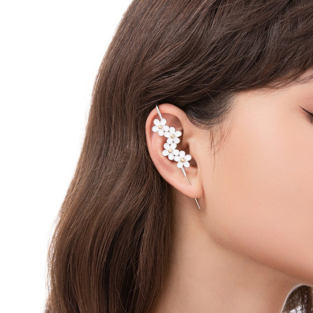 Daisy Flower ear cuff worn on the ear, profile view