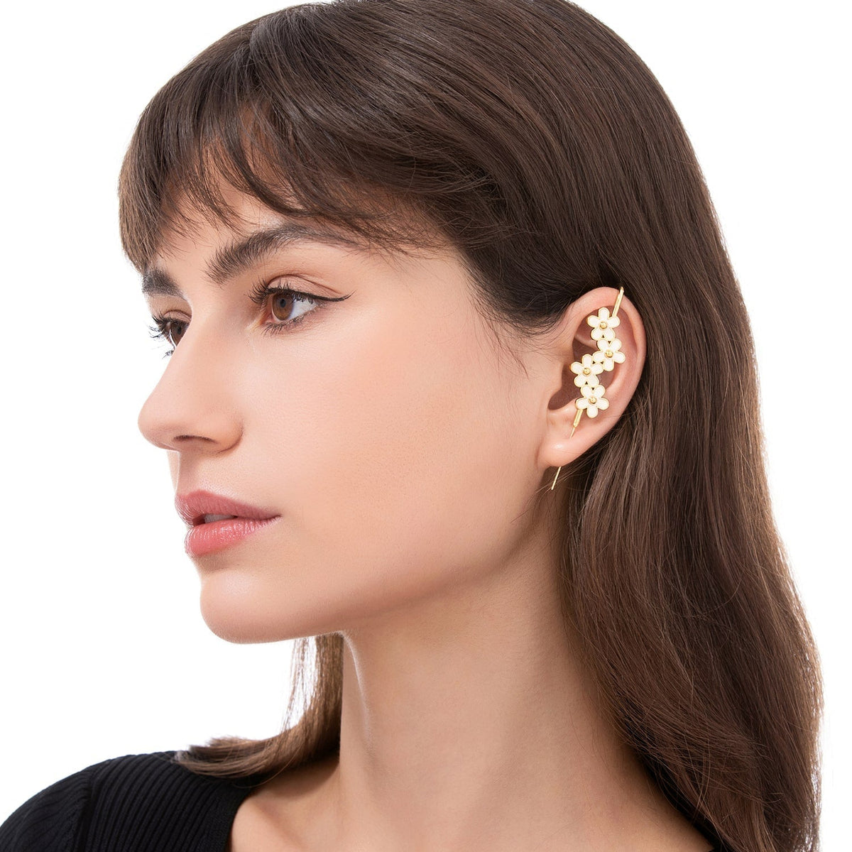 Daisy Flower ear cuff worn on the ear, profile view
