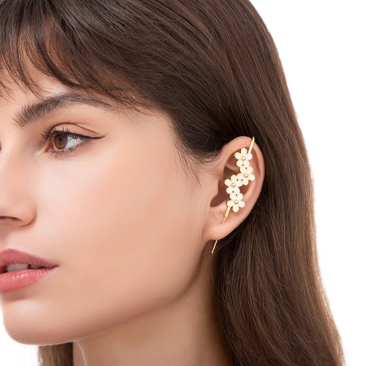 Daisy Flower ear cuff worn on the ear, profile view