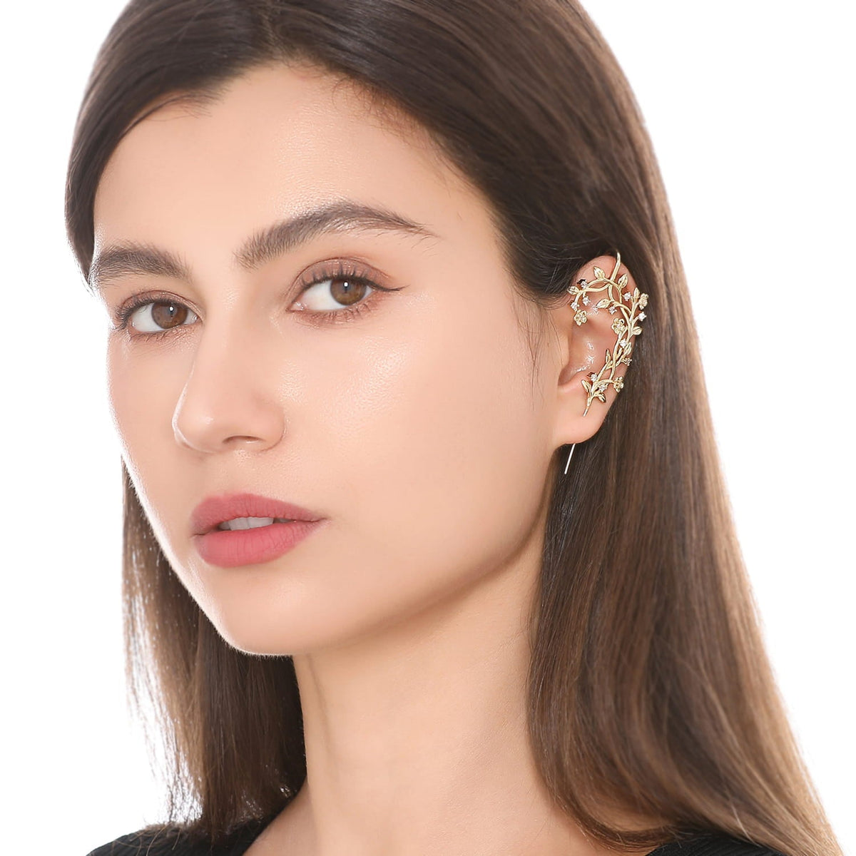 Flourishing ear cuff worn on the ear, profile view