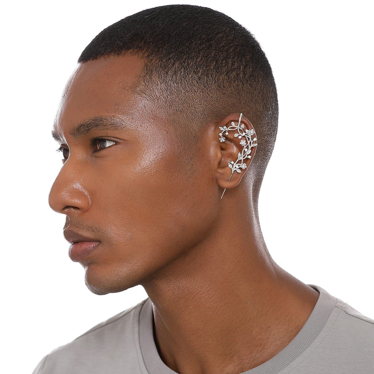 Flourishing ear cuff worn on the ear, profile view