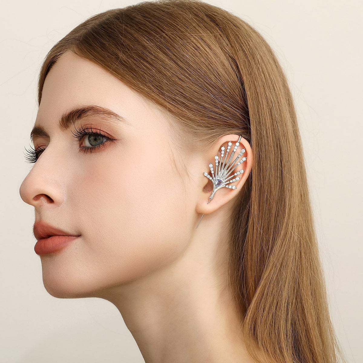 Ethereal Fountain ear cuff worn on the ear, profile view