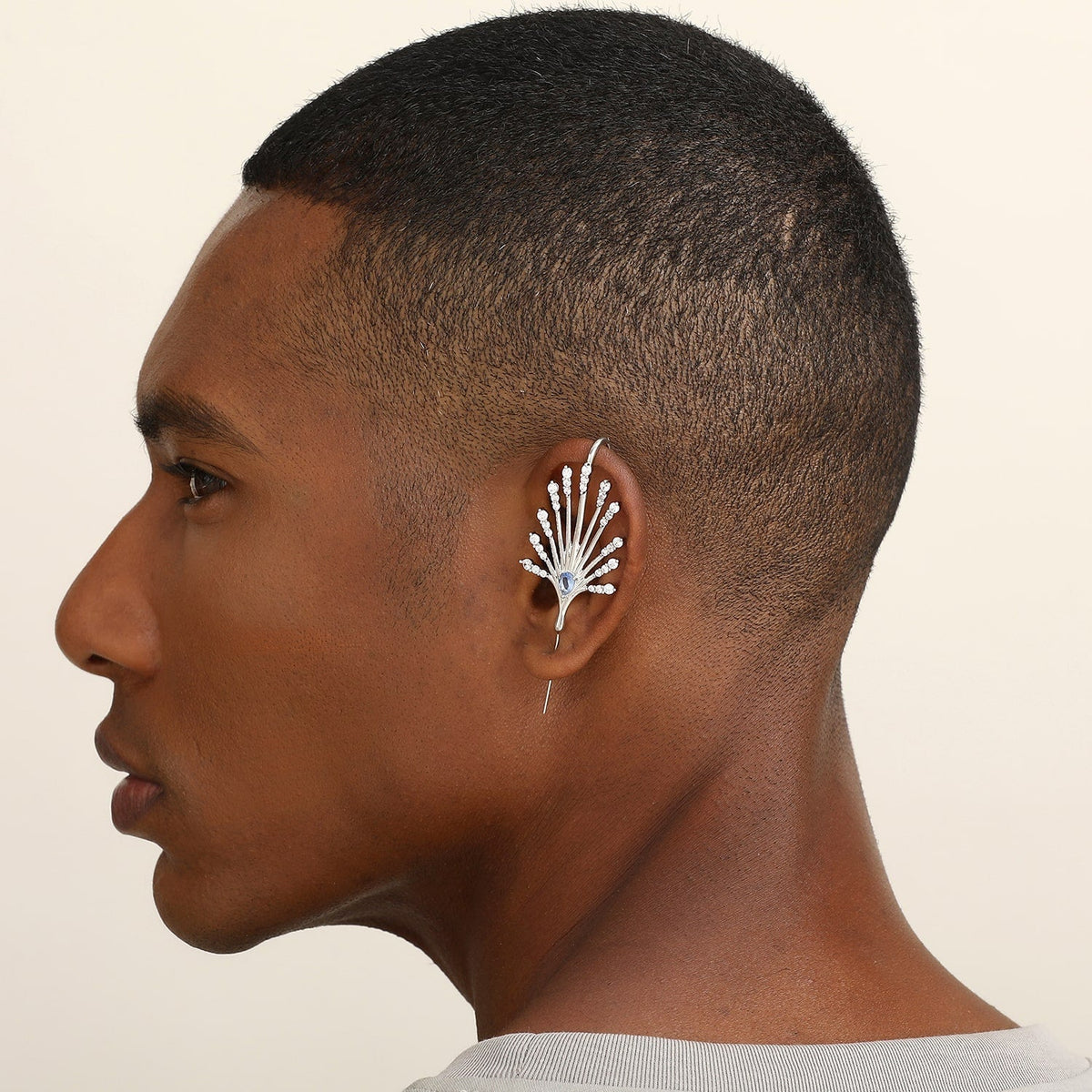 Ethereal Fountain ear cuff worn on the ear, profile view