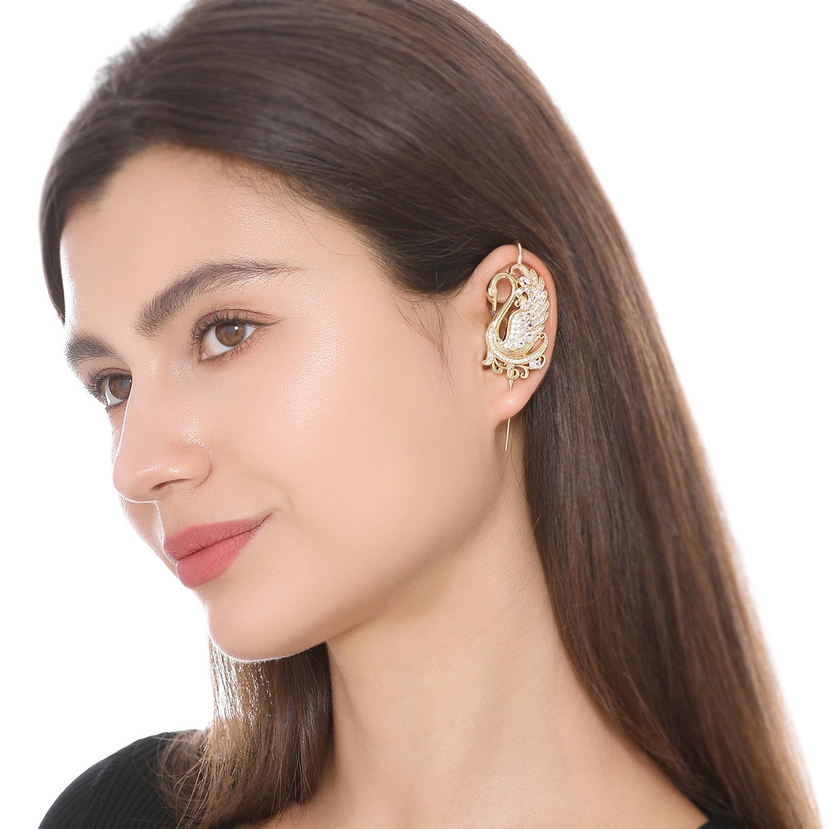 Graceful Swan ear cuff worn on the ear, profile view
