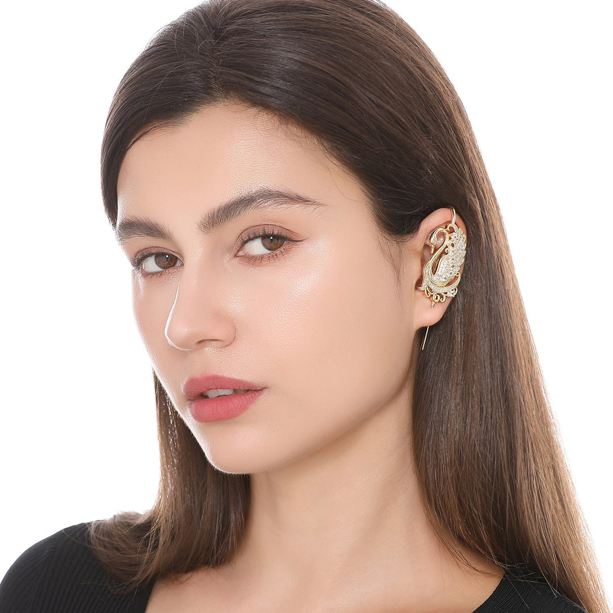 Graceful Swan ear cuff worn on the ear, profile view