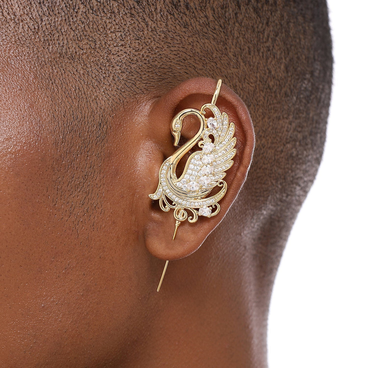Graceful Swan ear cuff worn on the ear, profile view