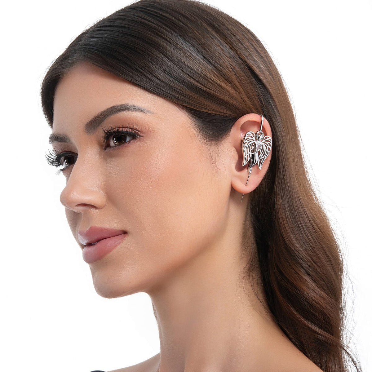Guardian Angel ear cuff in silver on a black ear form
