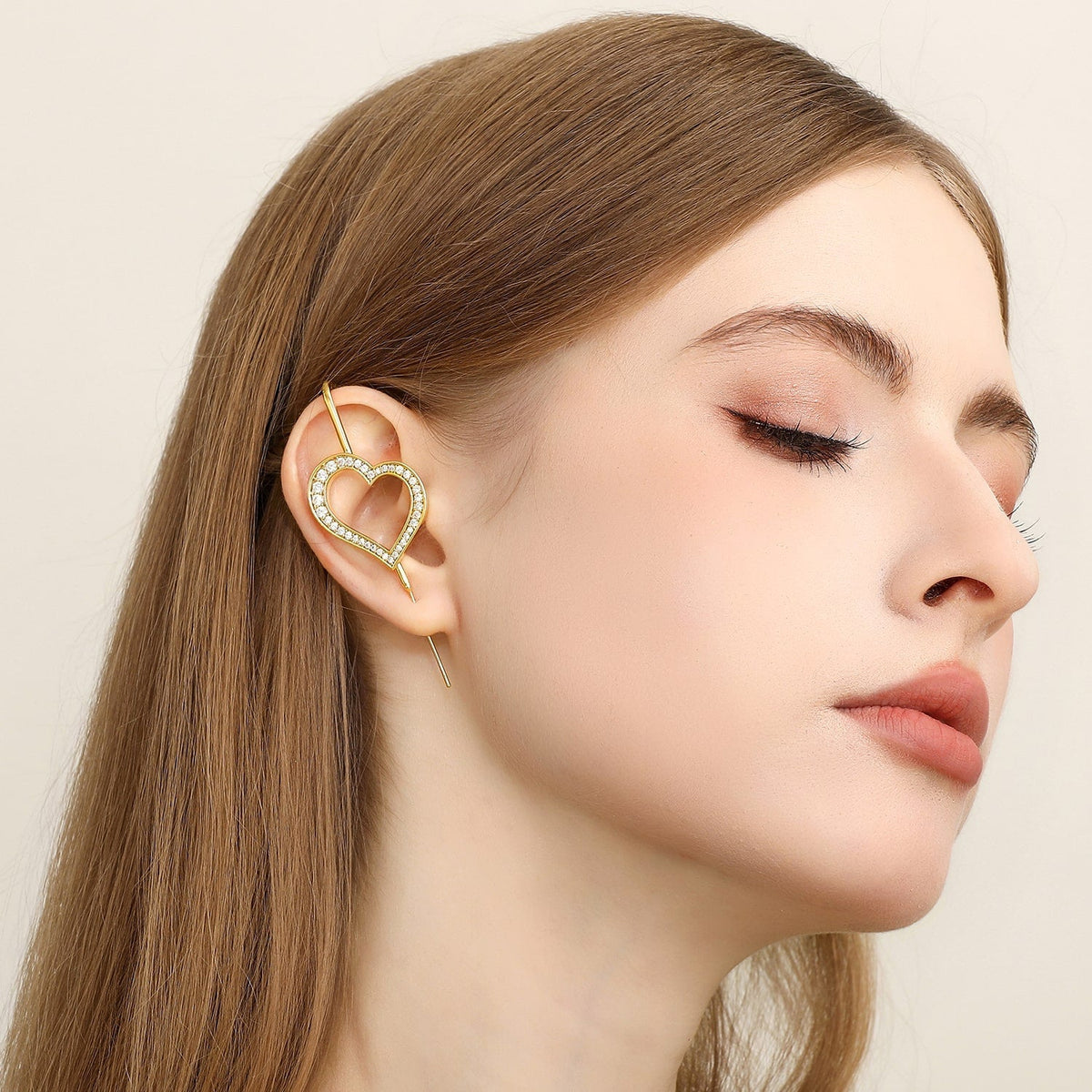 Pure Heart ear cuff worn on the ear, profile view