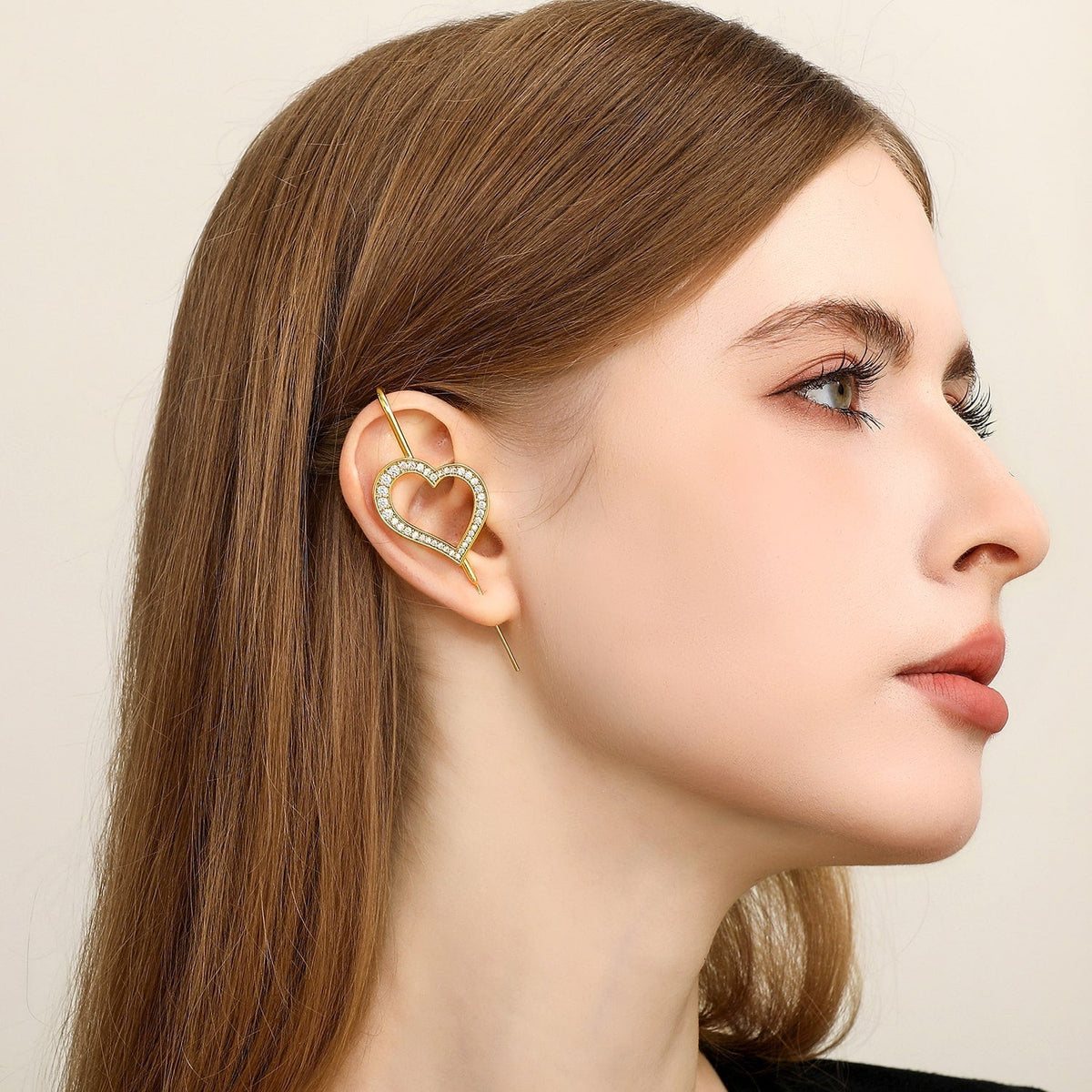 Pure Heart ear cuff worn on the ear, profile view