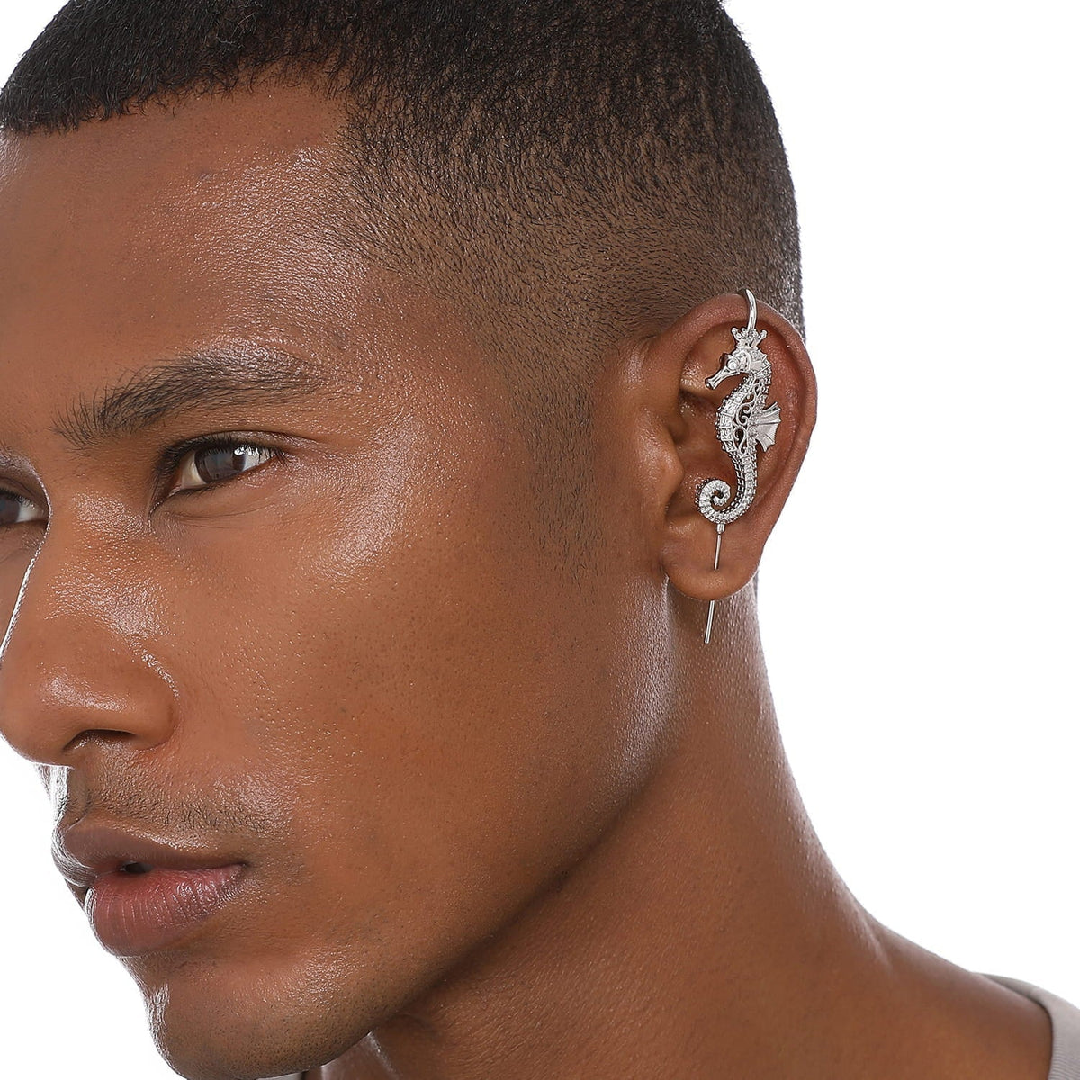 Imperial Seahorse ear cuff worn on the ear, profile view