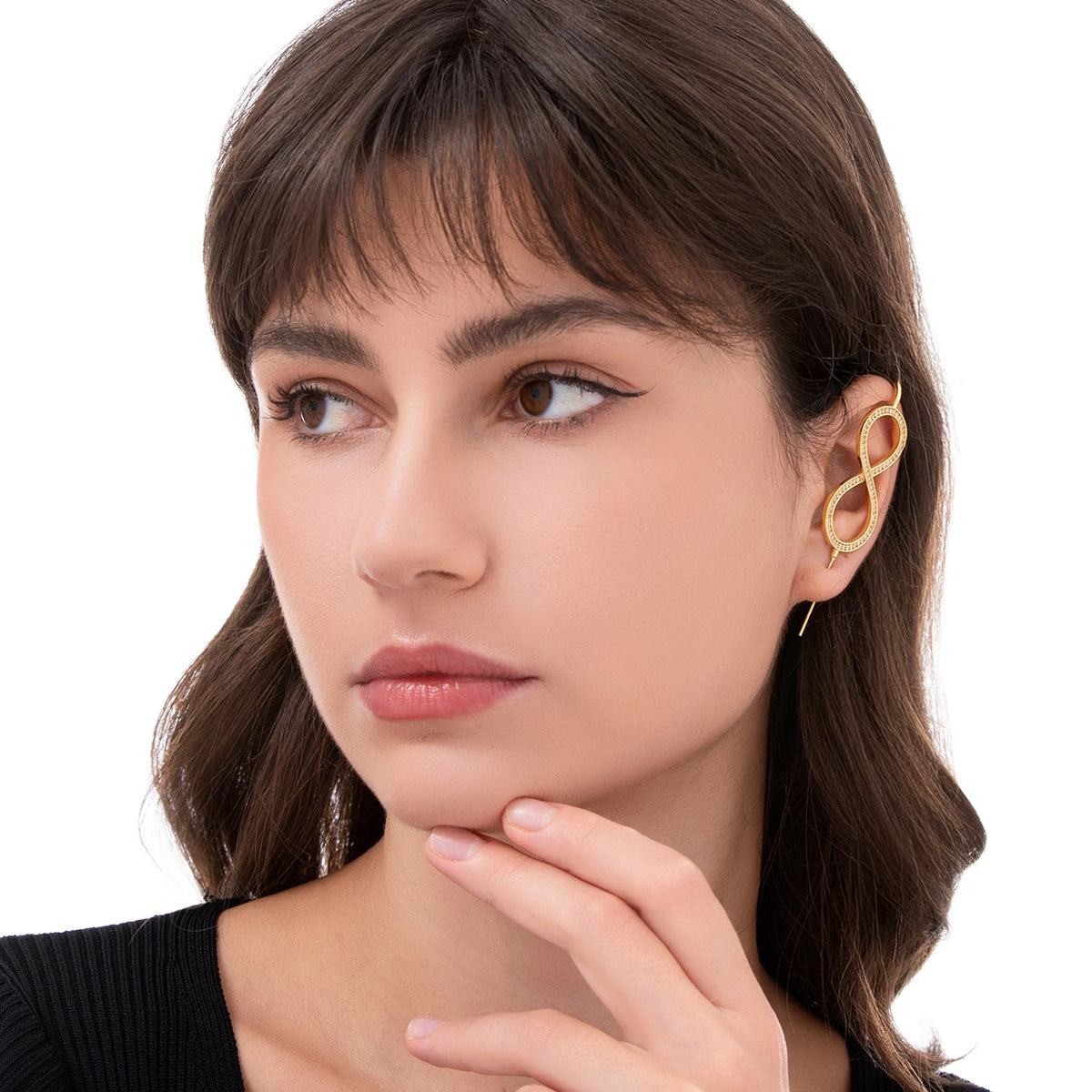 Infinity ear cuff worn on the ear, profile view