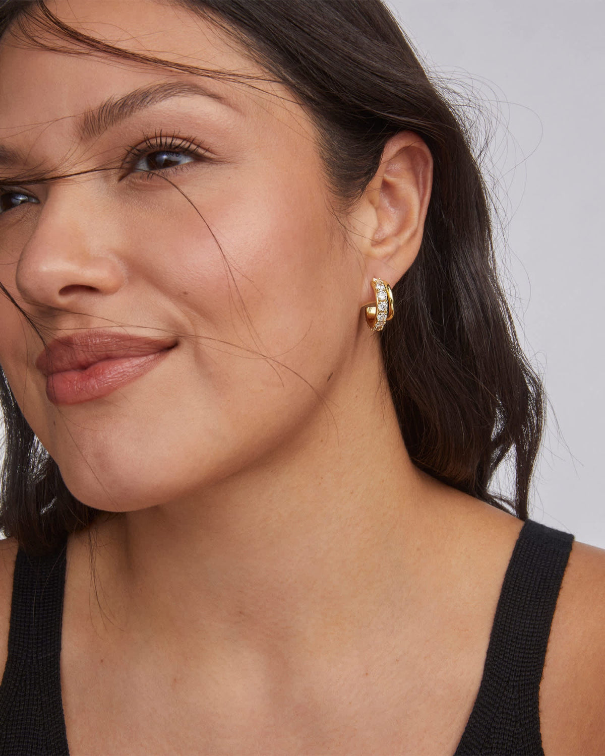 Avaline Livy Gold Huggie Earrings in White Crystal