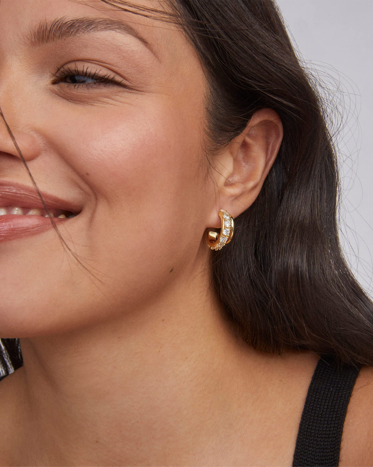 Avaline Livy Gold Huggie Earrings in White Crystal