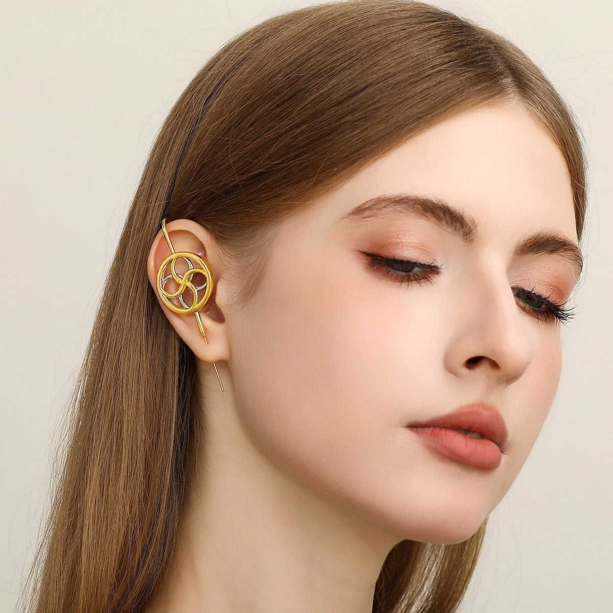 Kinetic Loop ear cuff worn on the ear, profile view